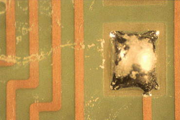 Figure 1: The flux residues here could haev bene caused by the formulation of the flux or by poor process conditions Figure 1: The flux residues here could have been caused by the formulation of the flux or by poor process conditions